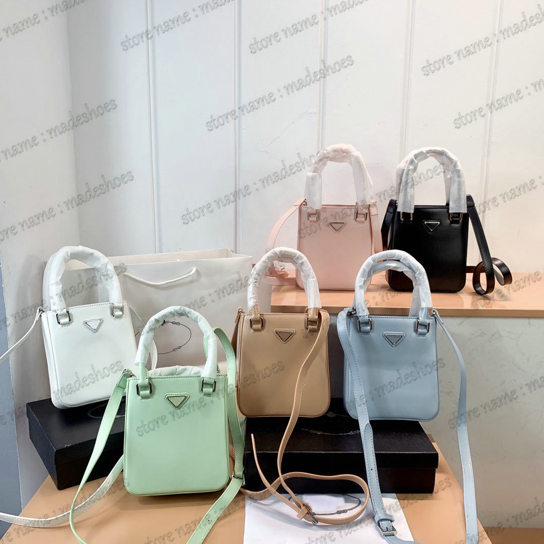 Small Brushed Leather Tote Bag Womens Designer Handbag Metal Triangle Logo Luxurys Mini Square Handle Bags
Small Brushed Leather Tote Bag Womens Designer Handbag Metal Triangle Logo Luxurys Mini Square Handle Bags
