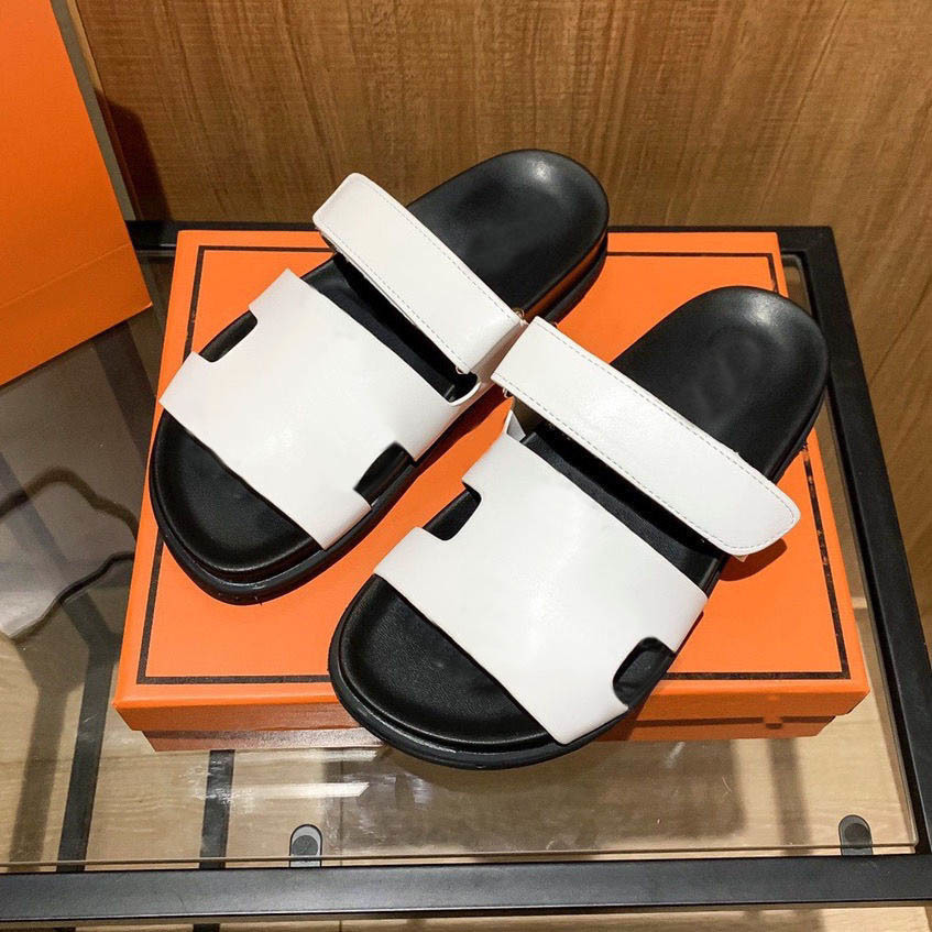 Summer drag women wear high-end leather Velcro flip flop casual old thick bottom cool drag slippers ladies
Summer drag women wear high-end leather Velcro flip flop casual old thick bottom cool drag slippers ladies
