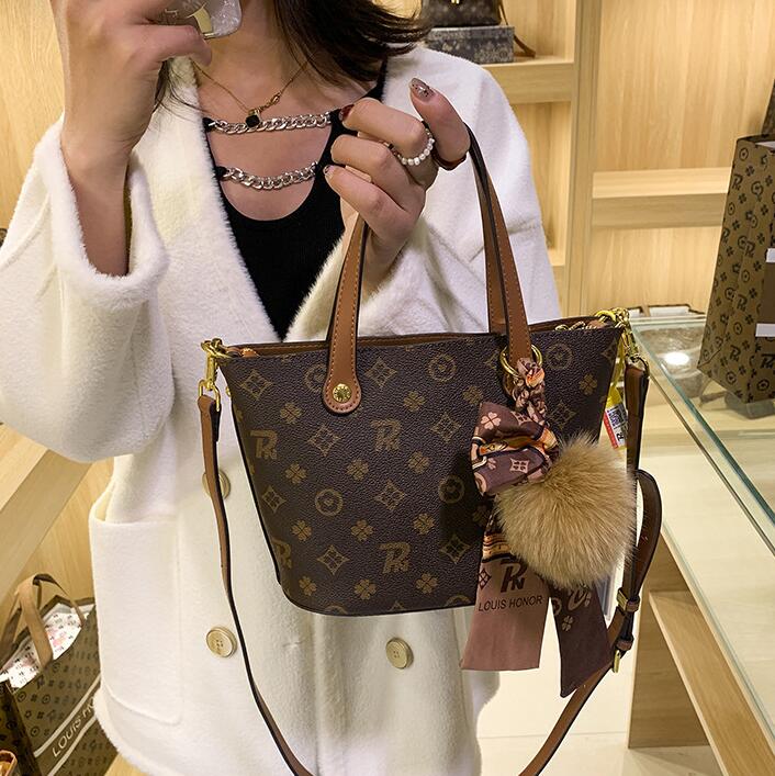 ladies leathers shoulder bags sweet and lovely ribbon bow foreign handbag simple and versatile printed fashion bucket bag classic contrast leather backpack
