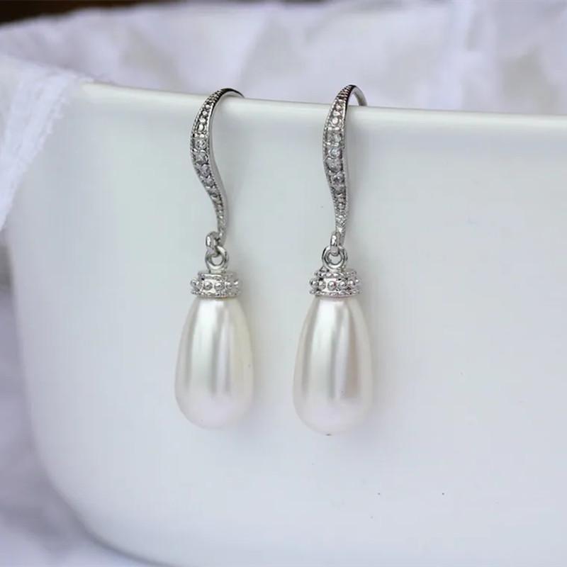 Dangle & Chandelier Exquisite Teardrop Imitation Pearl Earrings Classic Fashion Metal Silver Color Inlaid Zircon Crystal For WomenDangle
Dangle & Chandelier Exquisite Teardrop Imitation Pearl Earrings Classic Fashion Metal Silver Color Inlaid Zircon Crystal For WomenDangle