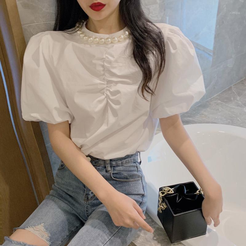 Women's Blouses & Shirts 2022 Summer Korea Fashion Women Casual White Beading O-Neck Puff Sleeve Plus Size Blouse And Top Blusas Femininas E
Women's Blouses & Shirts 2022 Summer Korea Fashion Women Casual White Beading O-Neck Puff Sleeve Plus Size Blouse And Top Blusas Femininas E