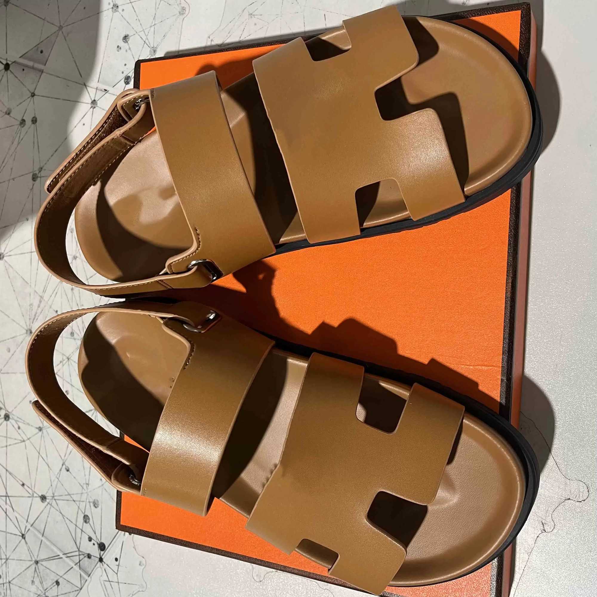 Chypre Sandals Women Men Flat Slippers Big Head Leather Hotel Shoes Classic Velcro Beach Shoes Brown Black White Top Quality Size 35-44, Color 2
Chypre Sandals Women Men Flat Slippers Big Head Leather Hotel Shoes Classic Velcro Beach Shoes Brown Black White Top Quality Size 35-44, Color 2