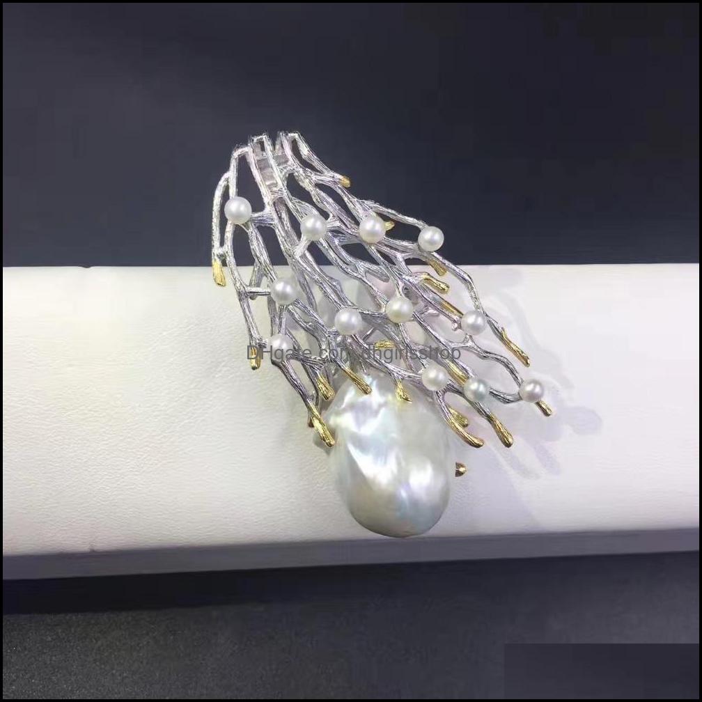 Pins Brooches Jewelry 100% Real Natural Fresh Water Brooch Pendant Double Use 925 Sterling Sier With Small Pearl Branch Of Tree Fas Dho0A
Pins Brooches Jewelry 100% Real Natural Fresh Water Brooch Pendant Double Use 925 Sterling Sier With Small Pearl Branch Of Tree Fas Dho0A