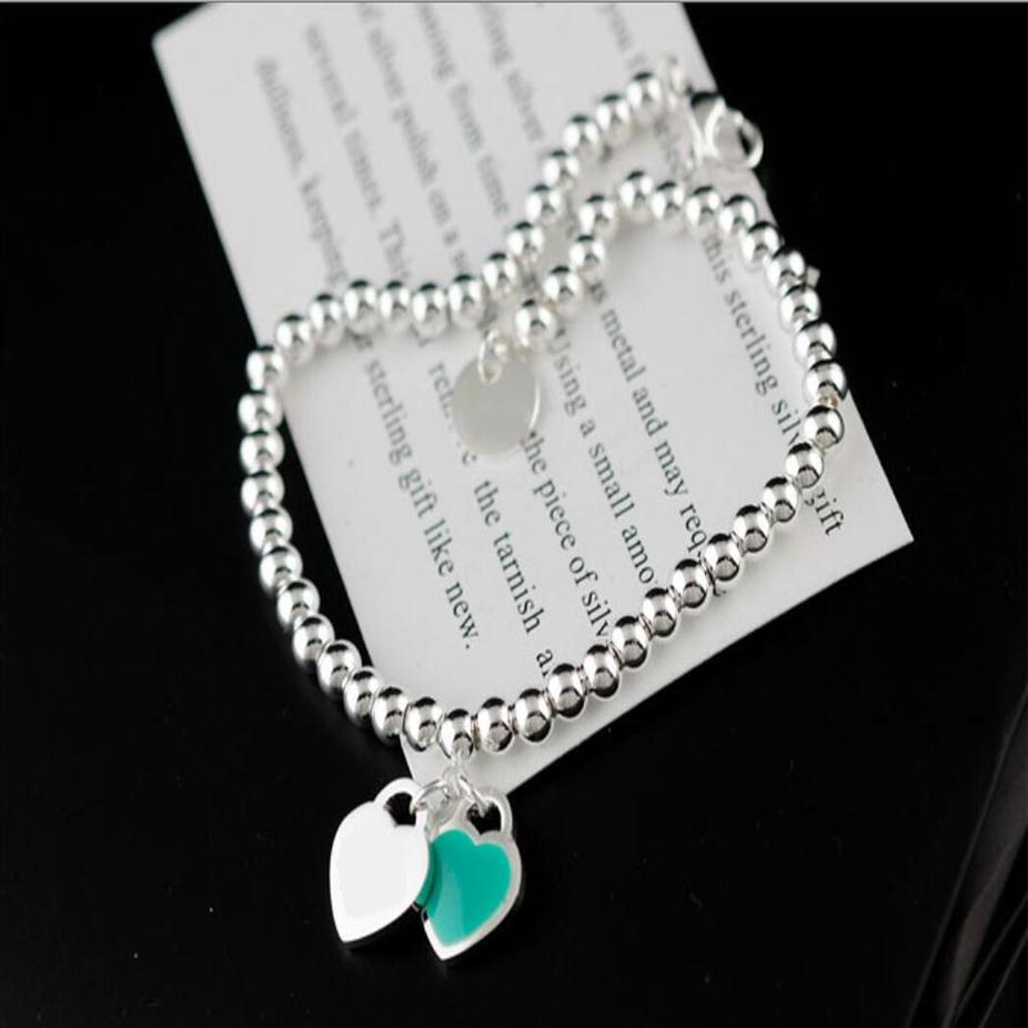 2021 big silver gold balls beads stainless steel high quality Charm Bracelets with double green heart and round plate box & d213O
2021 big silver gold balls beads stainless steel high quality Charm Bracelets with double green heart and round plate box & d213O