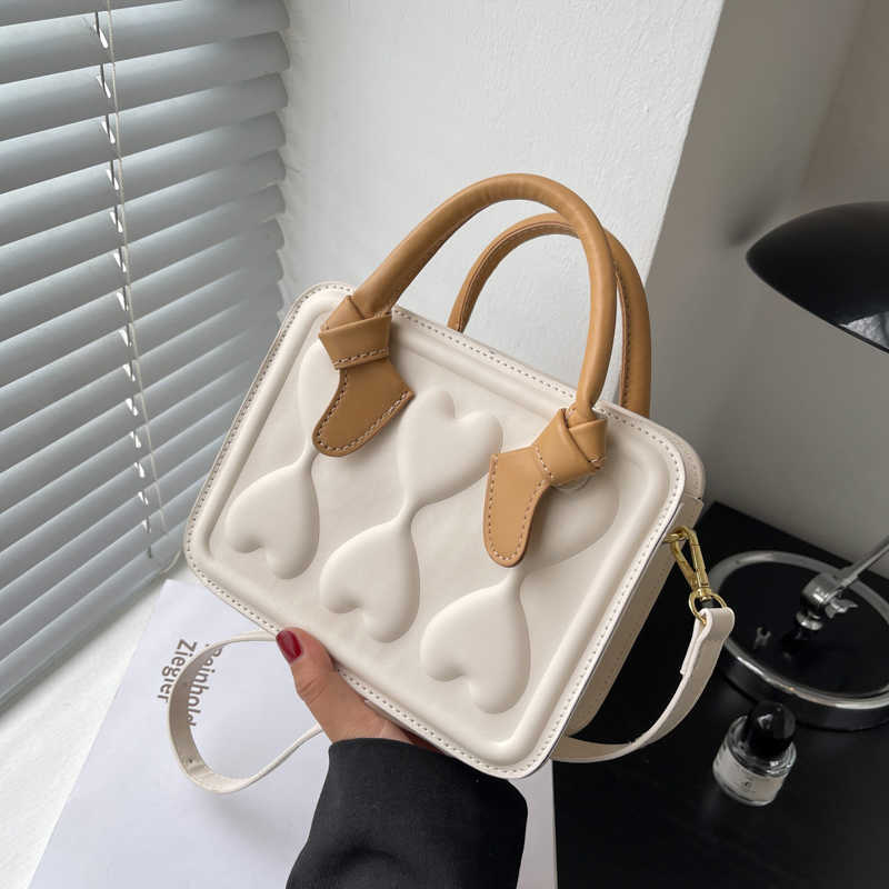 Bag female summer 2022 new heart-shaped decoration solid color small square bag portable biscuit bag Japanese and Korean Style Single, Creamy-white
Bag female summer 2022 new heart-shaped decoration solid color small square bag portable biscuit bag Japanese and Korean Style Single, Creamy-white