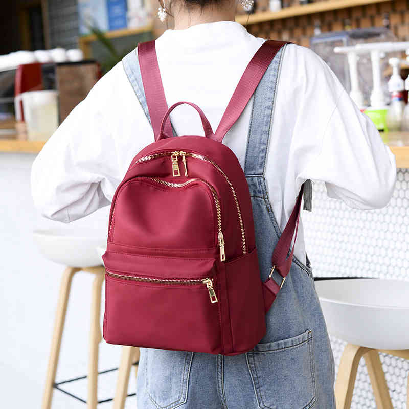 Handbags Oxford cloth new leisure college style schoolbag travel women's backpack Purse, Red
Handbags Oxford cloth new leisure college style schoolbag travel women's backpack Purse, Red
