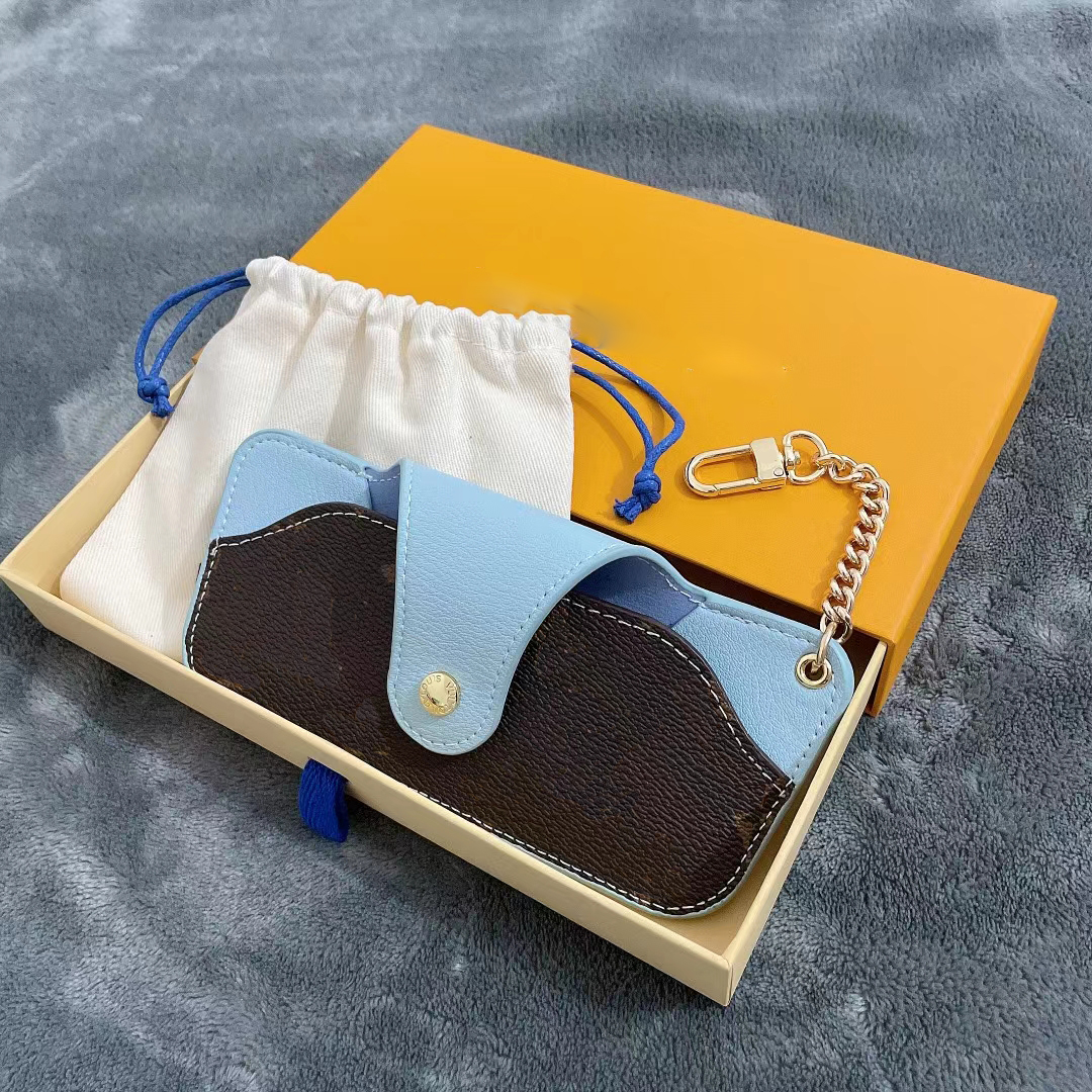 Fashion Designer Sunglasses Bag brand unisex Men Women Keather Key Ring Bule Pink Brown Sunglasses Cases With Box
Fashion Designer Sunglasses Bag brand unisex Men Women Keather Key Ring Bule Pink Brown Sunglasses Cases With Box