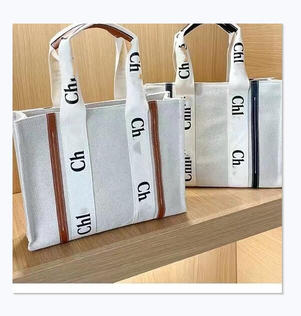 5A quality Women handbags WOODY Tote shopping bag handbag high NYLON hobo fashion linen Large Beach bags luxury designer travel Crossbody Shoulder bag Purses
5A quality Women handbags WOODY Tote shopping bag handbag high NYLON hobo fashion linen Large Beach bags luxury designer travel Crossbody Shoulder bag Purses