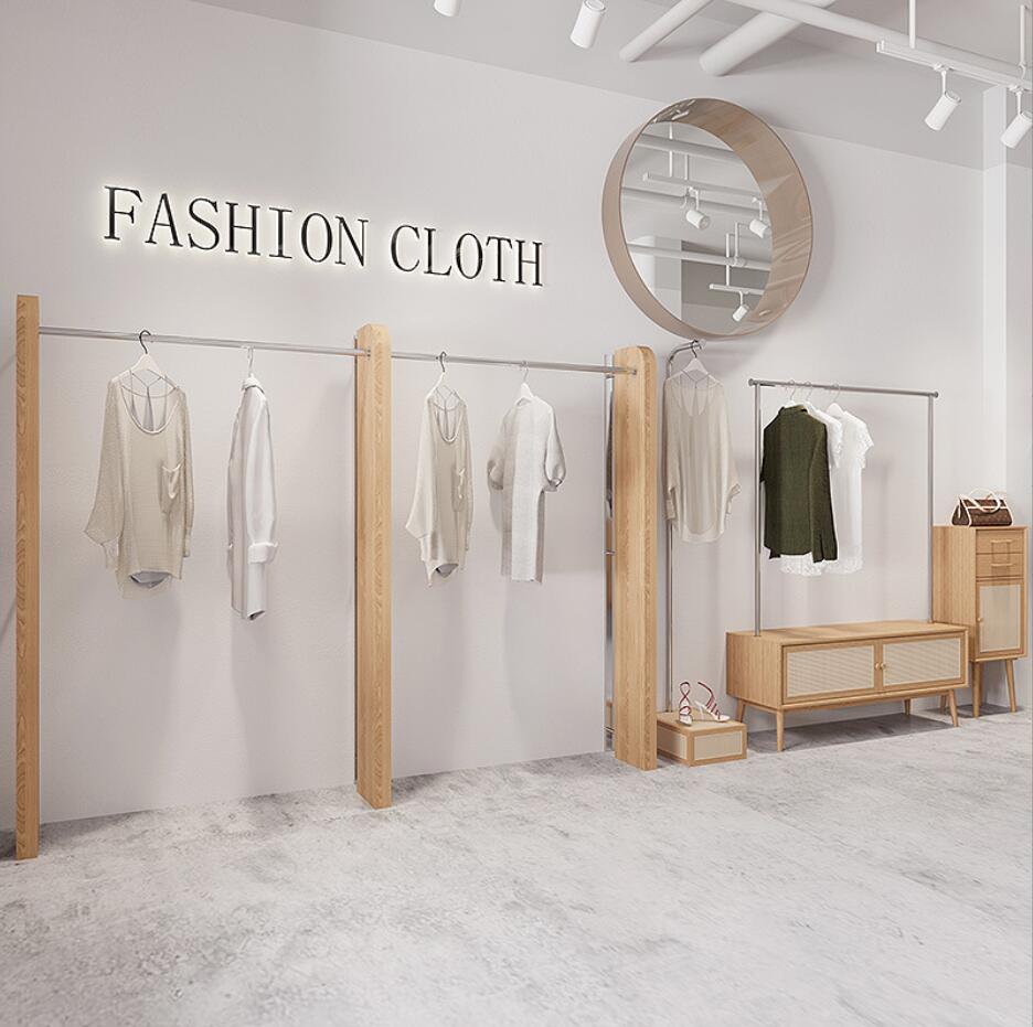 Clothing store display rack Commercial Furniture wall hanging racks floor stainless steel display women's cloth shelf