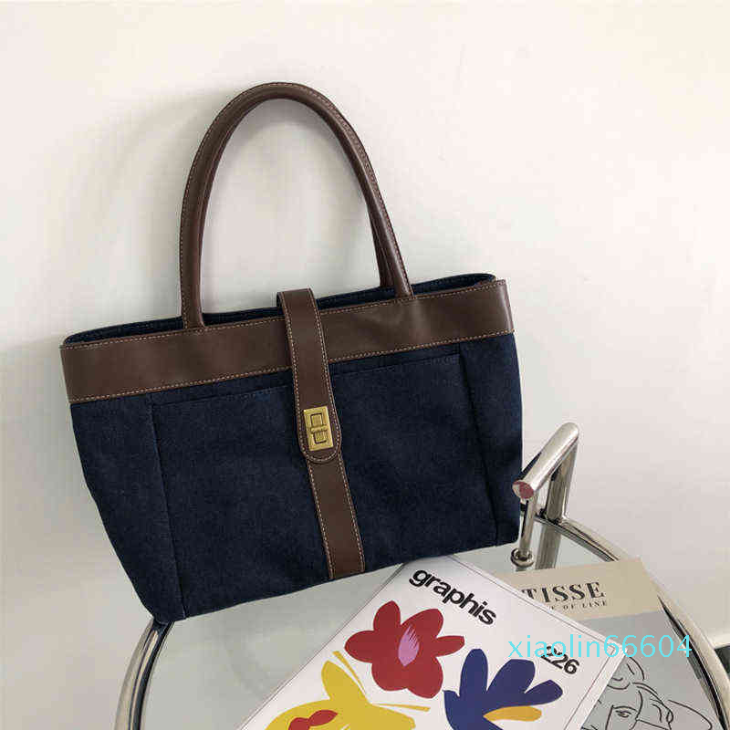 Designer-Medieval Vintage color matching denim one shoulder portable Tote Bag high capacity women's bag, Navy blue
Designer-Medieval Vintage color matching denim one shoulder portable Tote Bag high capacity women's bag, Navy blue