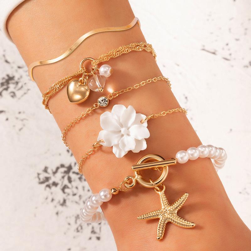 Link Chain 5Pcs/1Set Boho White Flower Starfish Bracelets For Women Girl Summer Bangle Sea Jewelry Accessories Wholesale GiftLink
Link Chain 5Pcs/1Set Boho White Flower Starfish Bracelets For Women Girl Summer Bangle Sea Jewelry Accessories Wholesale GiftLink