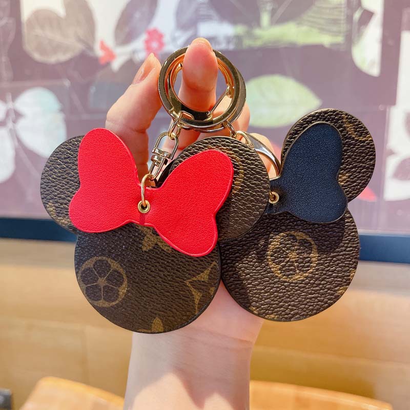 Brown Flower Keychains Rings Cartoon PU Leather Bow Mouse Gold Car Keyrings Holder Bag Pendant Charms Fashion Design Jewelry Gifts Key Chain
Brown Flower Keychains Rings Cartoon PU Leather Bow Mouse Gold Car Keyrings Holder Bag Pendant Charms Fashion Design Jewelry Gifts Key Chain