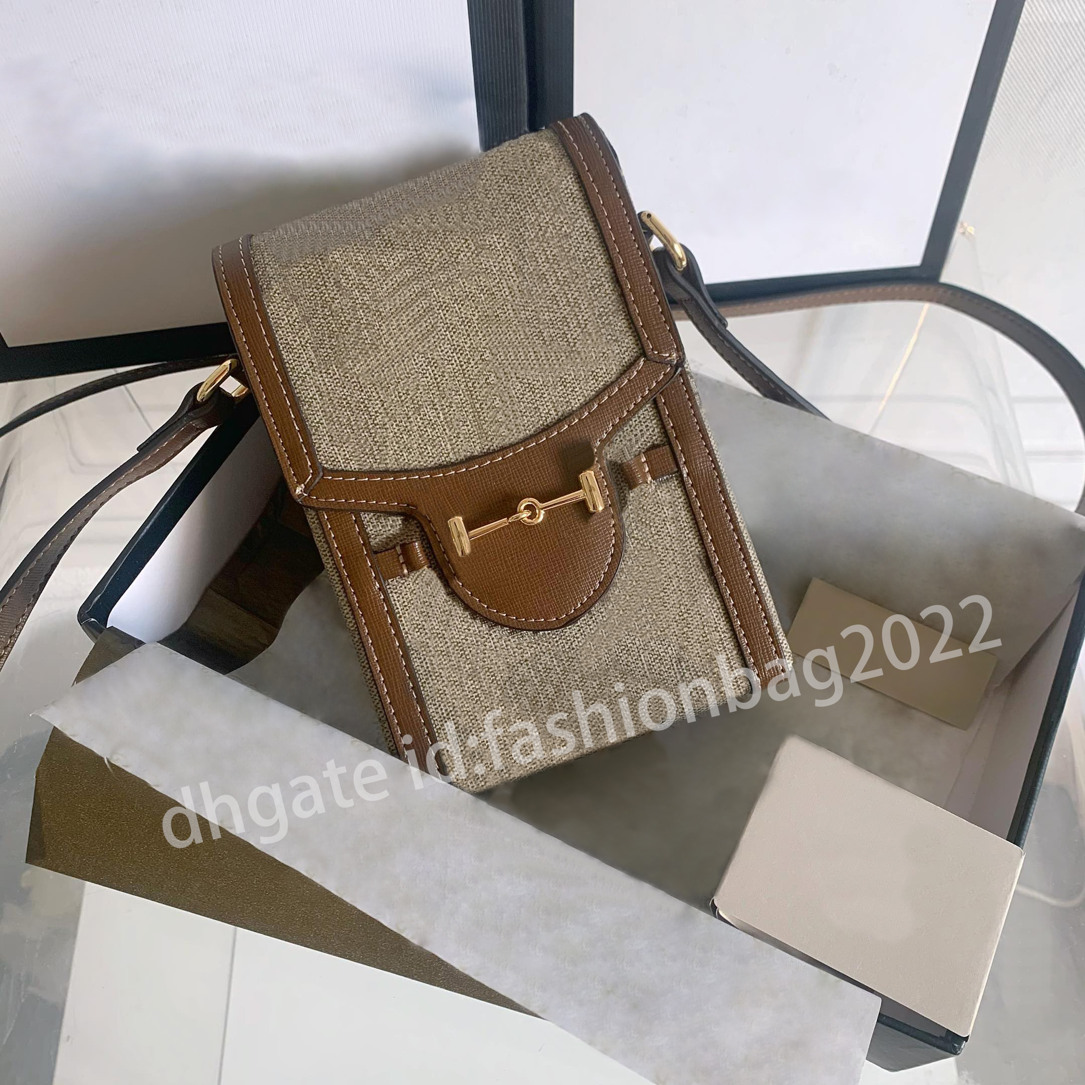 2022 Cross Body Designer Luxury wallet Women's summer Mini Shoulder real Leather Crossbody Mobile Phone Bag Wallet with high quality, Brown
2022 Cross Body Designer Luxury wallet Women's summer Mini Shoulder real Leather Crossbody Mobile Phone Bag Wallet with high quality, Brown