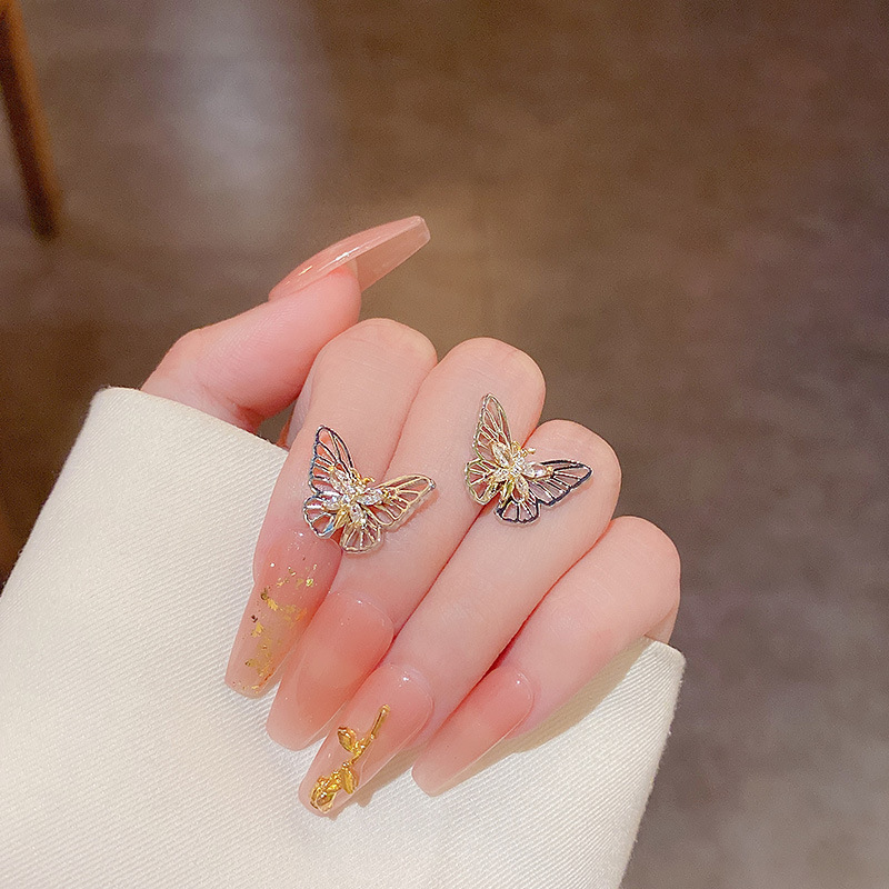 Hollow Out Zircon Butterfly Earrings Female 925 Silver Needle Ins Windnet Light Luxury Advanced Design
Hollow Out Zircon Butterfly Earrings Female 925 Silver Needle Ins Windnet Light Luxury Advanced Design