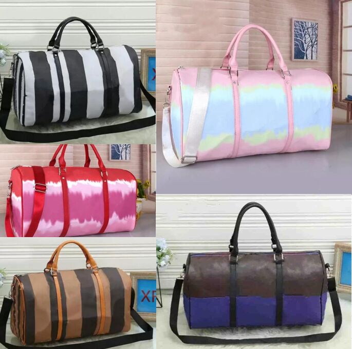 luxury Designer Duffle Bag leather Weekend Travel Bags Men Women Luggages creative Black letter stitching hanbags 45 55cm The large capacity tote Luggage backpacks, Tell me color
luxury Designer Duffle Bag leather Weekend Travel Bags Men Women Luggages creative Black letter stitching hanbags 45 55cm The large capacity tote Luggage backpacks, Tell me color