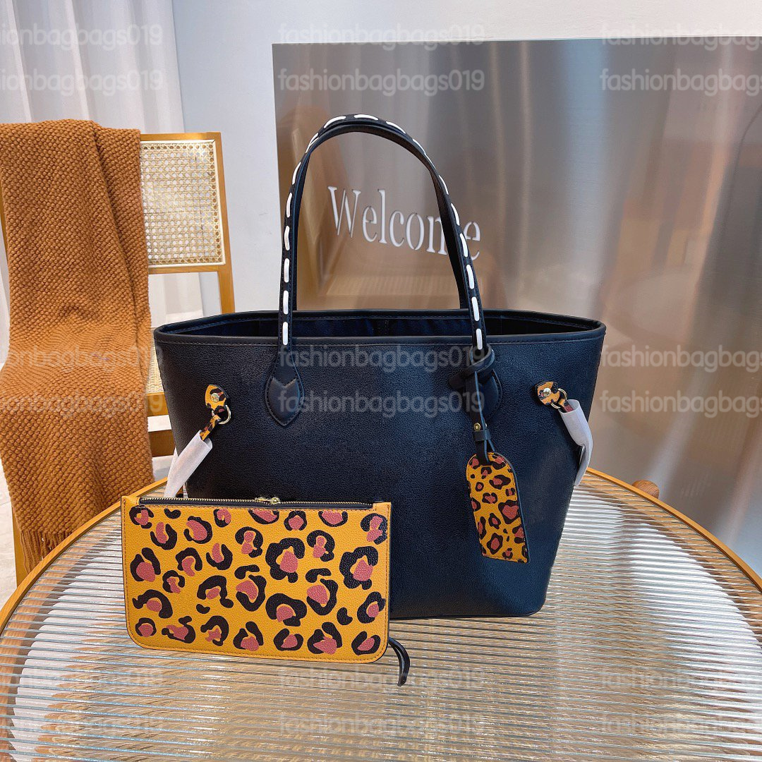 Wild At Heart Series Leopard Never MM Full Tote Stylish City Bags Black Embossed Monograms Canvas with Zip Clutch Pouch Luxurys Handbag
Wild At Heart Series Leopard Never MM Full Tote Stylish City Bags Black Embossed Monograms Canvas with Zip Clutch Pouch Luxurys Handbag