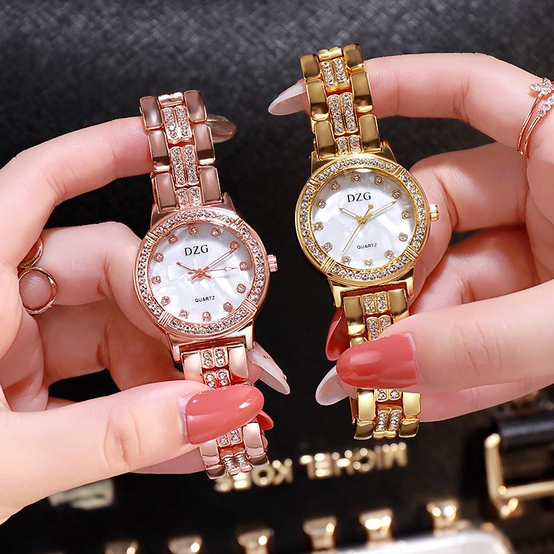 Wristwatches Fashion Casual Set Steel Band Woman Watch Rhinestone Shell Face Ladies Gold Quartz Montre DameWristwatches, Silver
Wristwatches Fashion Casual Set Steel Band Woman Watch Rhinestone Shell Face Ladies Gold Quartz Montre DameWristwatches, Silver