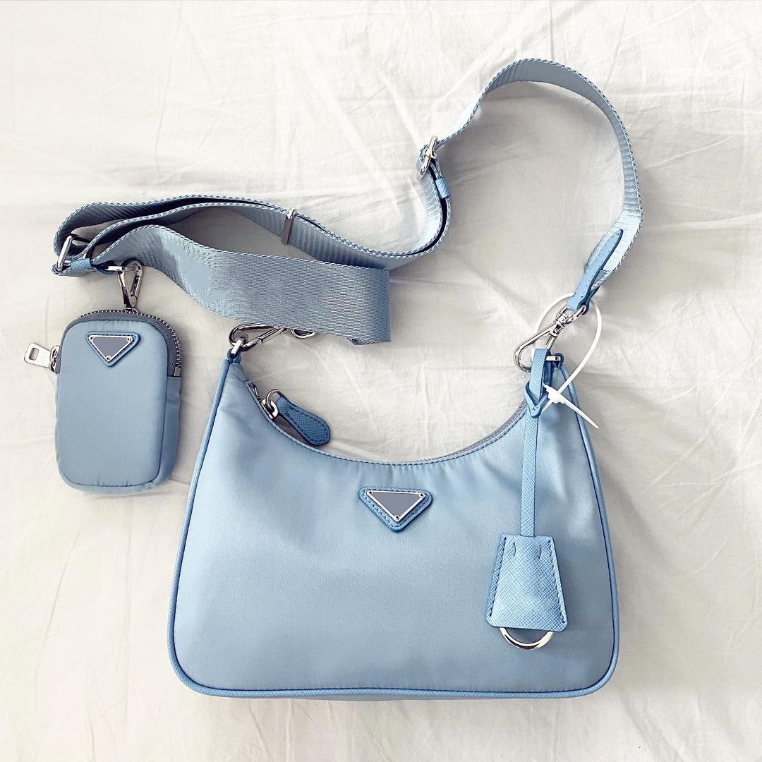 New style Top quality luxury bag designer totes NYLON purse Holders wholesale Single handbags cards coins tote mens card holder hangbag womens Cross Body Wallets
New style Top quality luxury bag designer totes NYLON purse Holders wholesale Single handbags cards coins tote mens card holder hangbag womens Cross Body Wallets