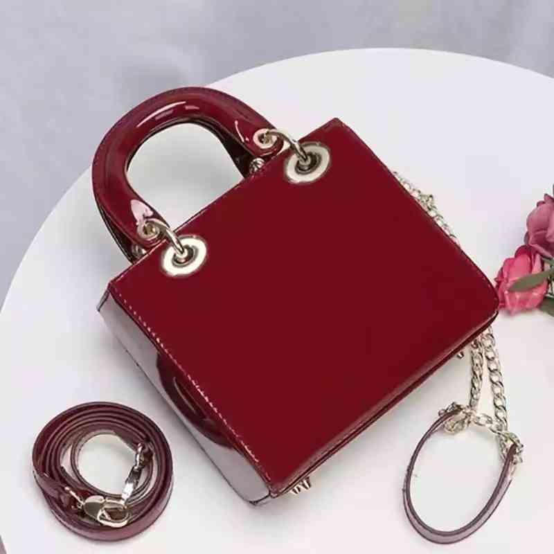 Lady d Letter Handbag Single Shoulder Bag Luxury Designer Fashion Travel Shopping True Leather, Aaa-18
Lady d Letter Handbag Single Shoulder Bag Luxury Designer Fashion Travel Shopping True Leather, Aaa-18