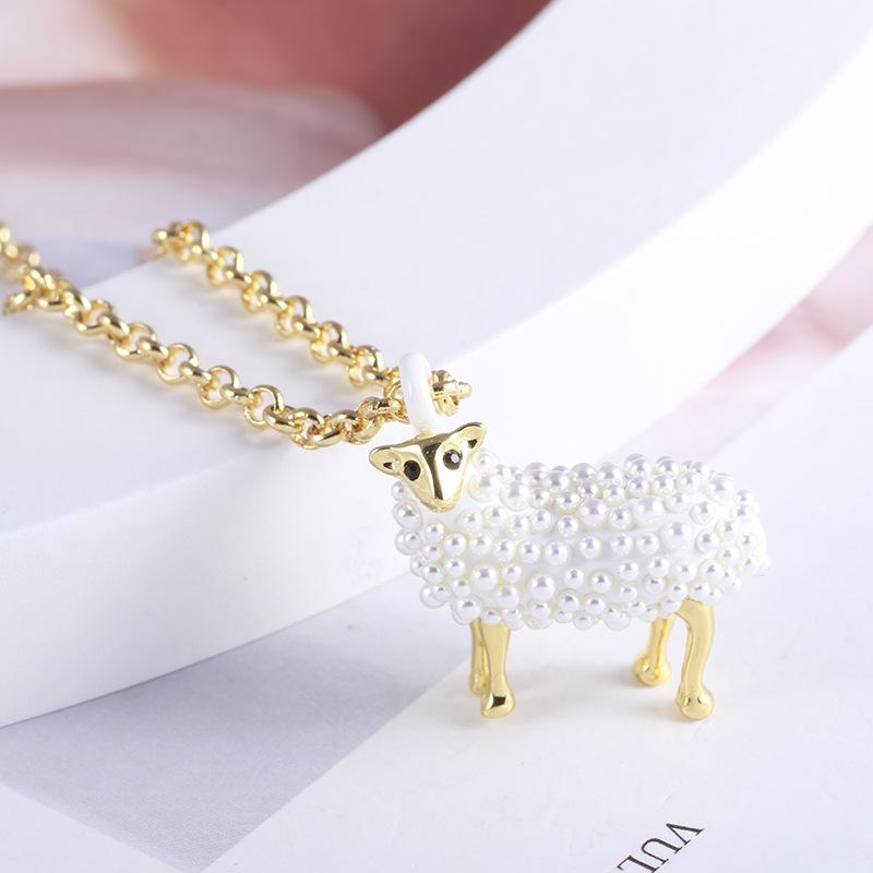 Pendant Necklaces European And American Jewelry Creative Fun Cute Lamb Shape Pearl Embellishment Temperament Long NecklacePendant
Pendant Necklaces European And American Jewelry Creative Fun Cute Lamb Shape Pearl Embellishment Temperament Long NecklacePendant