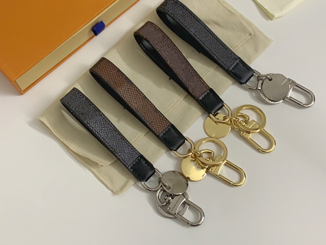 High Quality bag With box Luxury Accessories Key Buckle lovers Car Keychain Handmade Designer Leather Keychains Women Bags Pendant 7 Colors, Brown grid-gold 
High Quality bag With box Luxury Accessories Key Buckle lovers Car Keychain Handmade Designer Leather Keychains Women Bags Pendant 7 Colors, Brown grid-gold