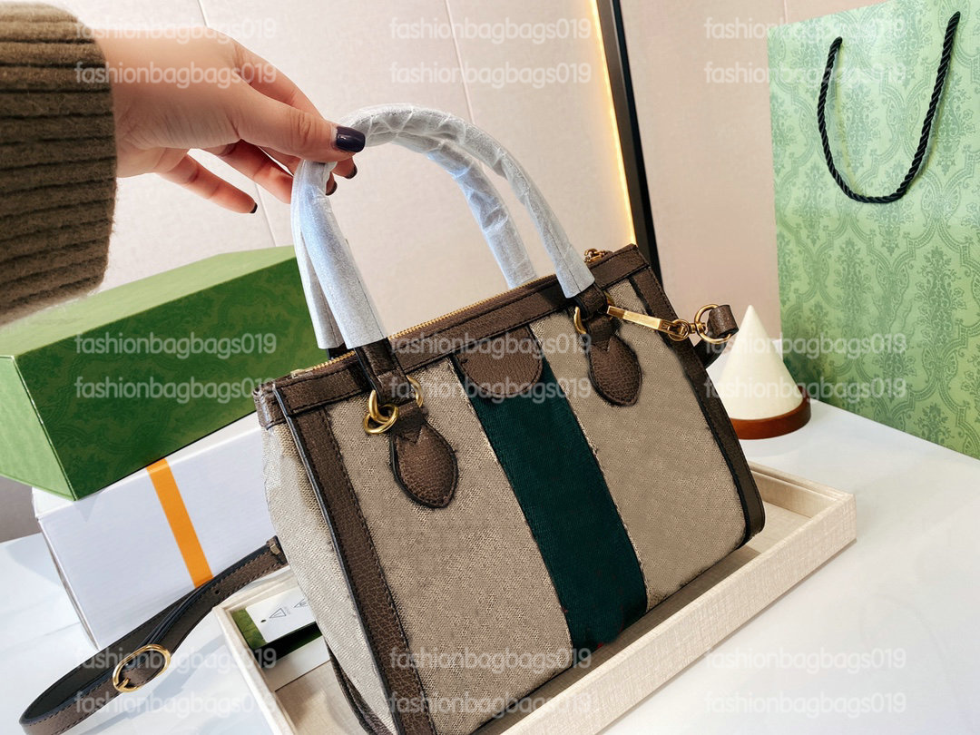 Womens Designer Handbag Ophidia 547551 Tote Shoulder Bag Vintage Luxurys Dark Coffee Leather Canvas with Red Green Stripes Handle Bags classic CrossBody
Womens Designer Handbag Ophidia 547551 Tote Shoulder Bag Vintage Luxurys Dark Coffee Leather Canvas with Red Green Stripes Handle Bags classic CrossBody