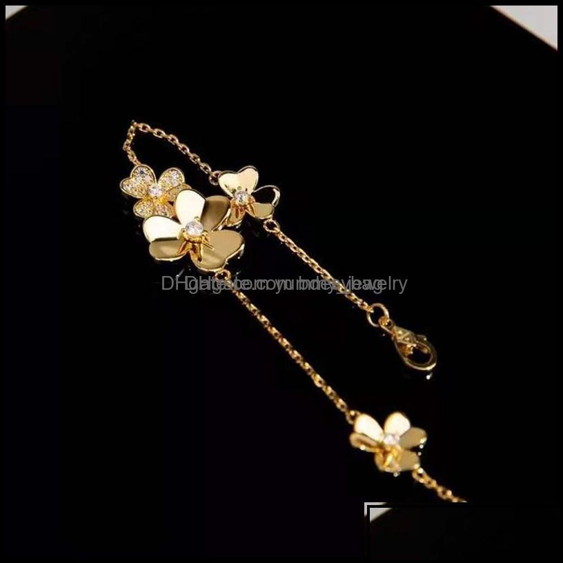 Charm Bracelets Jewelry Vc Clover Three Flower Bracelet Gold Plated Fl Rhinestone Hollow Van Cleese Fashion Luxury Brand Gift Drop Delivery
Charm Bracelets Jewelry Vc Clover Three Flower Bracelet Gold Plated Fl Rhinestone Hollow Van Cleese Fashion Luxury Brand Gift Drop Delivery