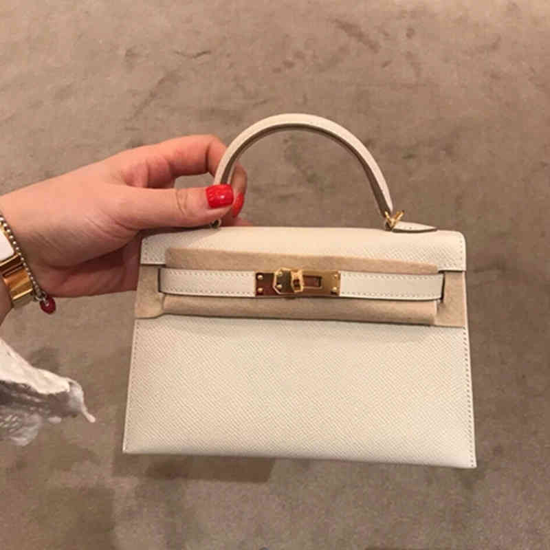 Herme Bag 2022 mini second generation Kely bag hand palm leather casual buckle single shoulder diagonal small square, Rice white 19cm
Herme Bag 2022 mini second generation Kely bag hand palm leather casual buckle single shoulder diagonal small square, Rice white 19cm