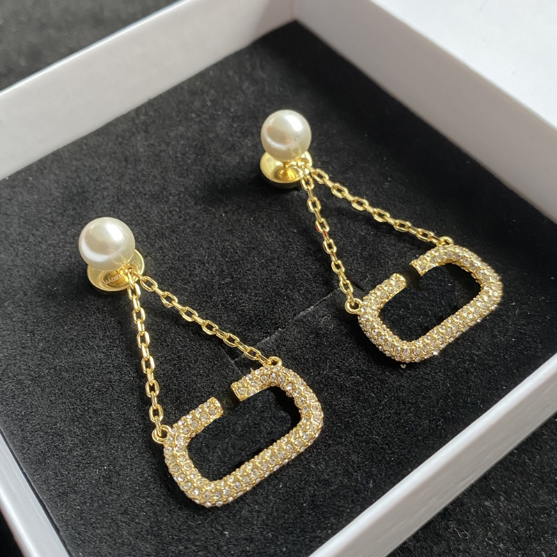 Designer Hoop Earrings For Womens Fashion Pearl Gold Diamonds Earrings Mens Jewelry Luxury Love Couple Hoop Earring Studs 2204202D 
Designer Hoop Earrings For Womens Fashion Pearl Gold Diamonds Earrings Mens Jewelry Luxury Love Couple Hoop Earring Studs 2204202D
