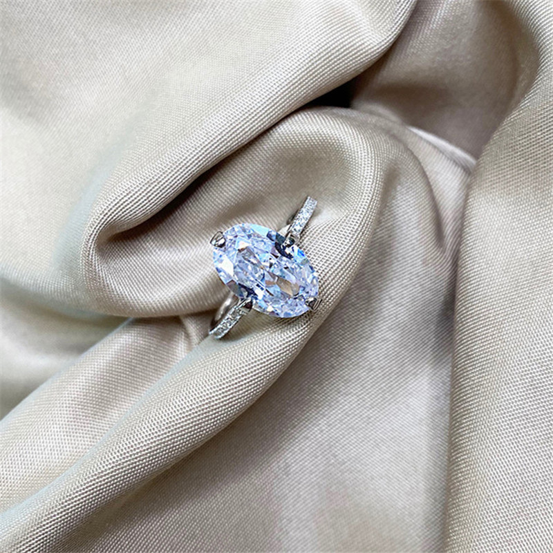 Charm Luxury ring Size 5-10 Jewelry 925 Sterling Silver 5A Cubic Zirconia Oval White Diamond Wedding Rings Engagement Propose Bride rings Friend Gift With Box 
Charm Luxury ring Size 5-10 Jewelry 925 Sterling Silver 5A Cubic Zirconia Oval White Diamond Wedding Rings Engagement Propose Bride rings Friend Gift With Box