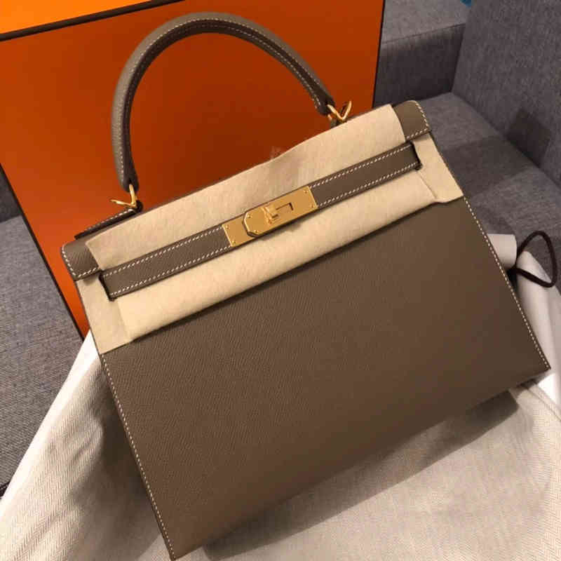 Luxury H Bags 2022 Handbags Designer Herme Fashion h Home Kelys Leather Leisure Women's Palm Grain Cowhide Medium One Shoulder Handbag, Dark blue gold button (25cm)
Luxury H Bags 2022 Handbags Designer Herme Fashion h Home Kelys Leather Leisure Women's Palm Grain Cowhide Medium One Shoulder Handbag, Dark blue gold button (25cm)