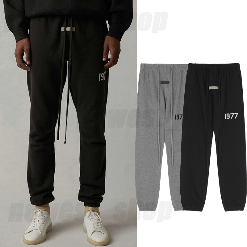 designer streetwear men' womens pants classic letter flocking 1977 loose Drawstring oversize high street sweatpants Joggers hip hop trousers, Black
designer streetwear men' womens pants classic letter flocking 1977 loose Drawstring oversize high street sweatpants Joggers hip hop trousers, Black