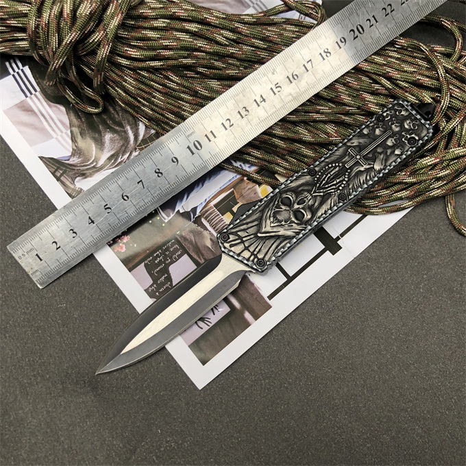 cross skull automatic Knives 440 Blade Outdoor camping portable pocket knife wilderness survival tactical AUTO Knife
cross skull automatic Knives 440 Blade Outdoor camping portable pocket knife wilderness survival tactical AUTO Knife