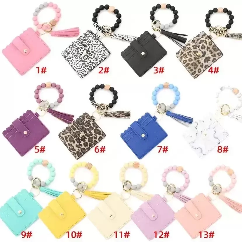13 Styles Fashion PU Leather Bracelet Wallet Keychain Party Favor Tassels Bangle Key Ring Holder Card Bag Silicone Beaded Wristl
13 Styles Fashion PU Leather Bracelet Wallet Keychain Party Favor Tassels Bangle Key Ring Holder Card Bag Silicone Beaded Wristl