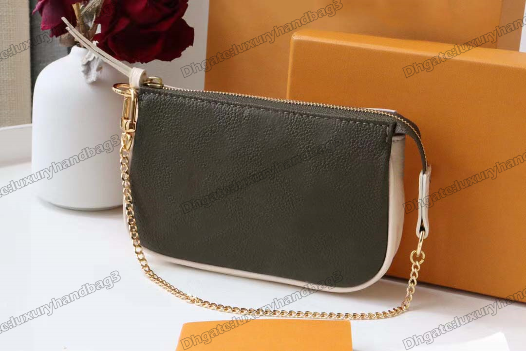 M81284 Mini Pochette Clutch Bag Spring Escape Embossed Monograms Empreinte Leather Two-In-One Multi-Function Bags Zipped Pockets Shoulder Bags Designers Bag
M81284 Mini Pochette Clutch Bag Spring Escape Embossed Monograms Empreinte Leather Two-In-One Multi-Function Bags Zipped Pockets Shoulder Bags Designers Bag