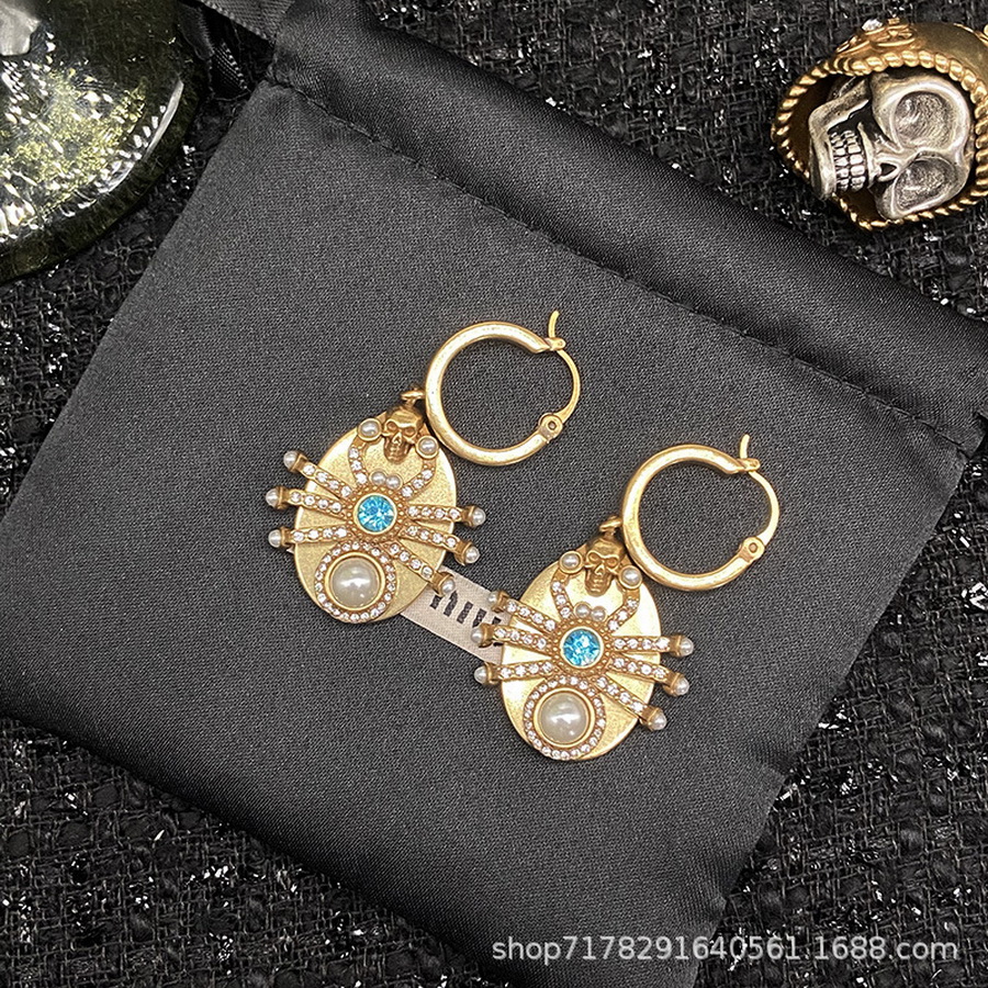 New designed Dangle rivet skull pin women earrings ear hoop punk style hip-hop trend ladies earring studs E01000
New designed Dangle rivet skull pin women earrings ear hoop punk style hip-hop trend ladies earring studs E01000