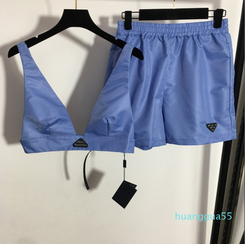 Women's Two Piece Pants Set With Triangle Metal V Neck Vest Mini Short Set Streetwear Fashion Crop Top 2022 New Tracksuit, Bust bag
Women's Two Piece Pants Set With Triangle Metal V Neck Vest Mini Short Set Streetwear Fashion Crop Top 2022 New Tracksuit, Bust bag