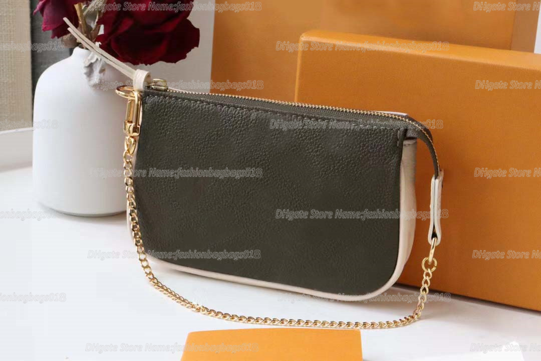 M81284 Mini Pochette Clutch Bag Spring Escape Embossed Monograms Empreinte Leather Two-In-One Multi-Function Bags Zipped Pockets Shoulder Bags Designers Bag
M81284 Mini Pochette Clutch Bag Spring Escape Embossed Monograms Empreinte Leather Two-In-One Multi-Function Bags Zipped Pockets Shoulder Bags Designers Bag