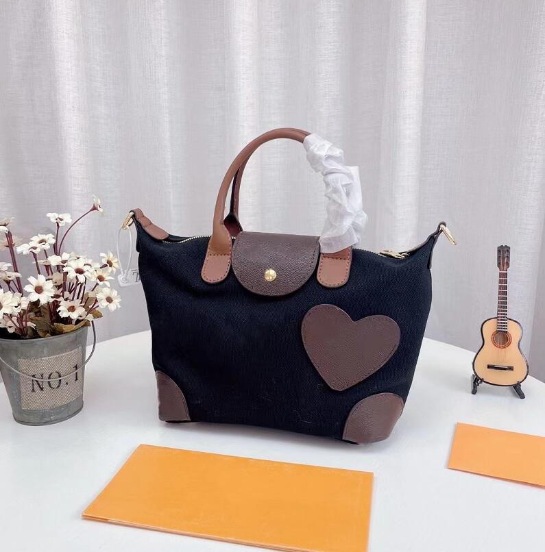 Fashion Canvas Zipper Totes Letter Leather Leisure Women Handbag Simple High Capacity Designer Heart Pattern Tricolor Shopping Bags Shoulder Bag, Black
Fashion Canvas Zipper Totes Letter Leather Leisure Women Handbag Simple High Capacity Designer Heart Pattern Tricolor Shopping Bags Shoulder Bag, Black