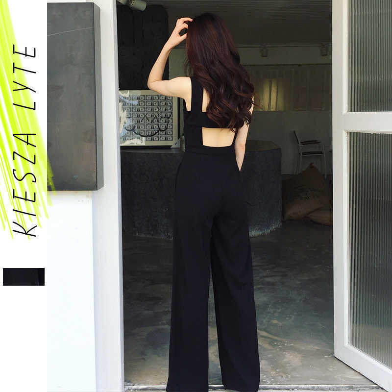 spring summer women black jumpsuit high waisted open back baggy long wide leg jumpsuits fashion Casual Romper Streetwear 210608
spring summer women black jumpsuit high waisted open back baggy long wide leg jumpsuits fashion Casual Romper Streetwear 210608