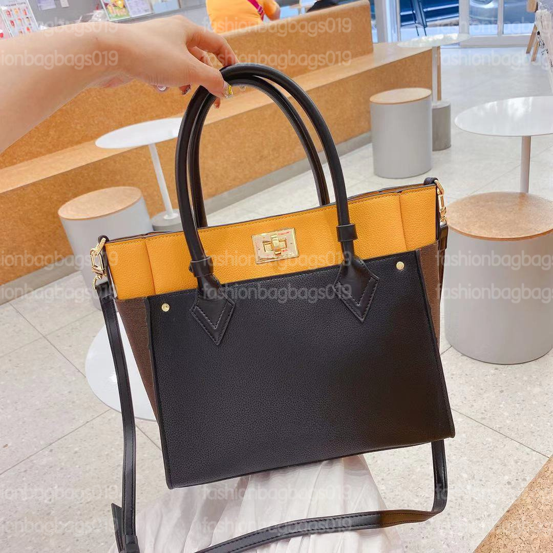 L Brand Bag ON MY SIDE MM Tote Elegant Bag Monograms Canvas Paneled Grained Leather with Twist Lock Top Handle Womens Designer Luxurys Shoulder Bag
L Brand Bag ON MY SIDE MM Tote Elegant Bag Monograms Canvas Paneled Grained Leather with Twist Lock Top Handle Womens Designer Luxurys Shoulder Bag