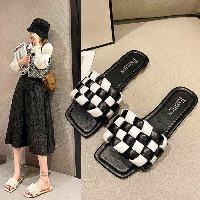 in the Summer of 2022, Woven Checkered Flat Bottomed Women's Beach Slippers Are Worn Outside. They Versatile, Gentle and, Green
in the Summer of 2022, Woven Checkered Flat Bottomed Women's Beach Slippers Are Worn Outside. They Versatile, Gentle and, Green