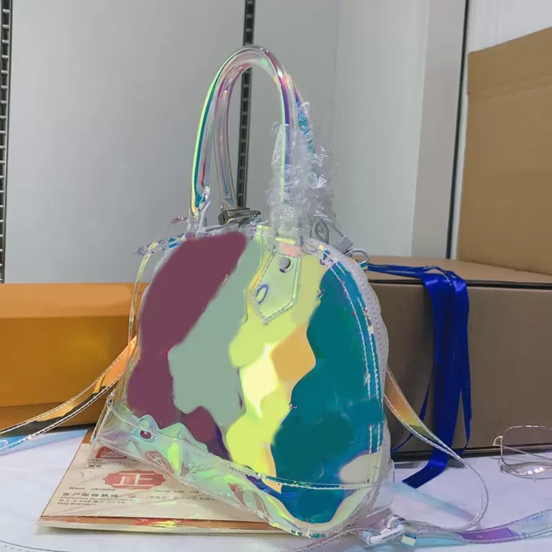 Dazzling Alam Shell Bag Women Handbag Purse PVC Transparent Tote Bags Classic Letter Removable Crossbody Shoulder Strap High Quality Clear Handbags 1588
Dazzling Alam Shell Bag Women Handbag Purse PVC Transparent Tote Bags Classic Letter Removable Crossbody Shoulder Strap High Quality Clear Handbags 1588