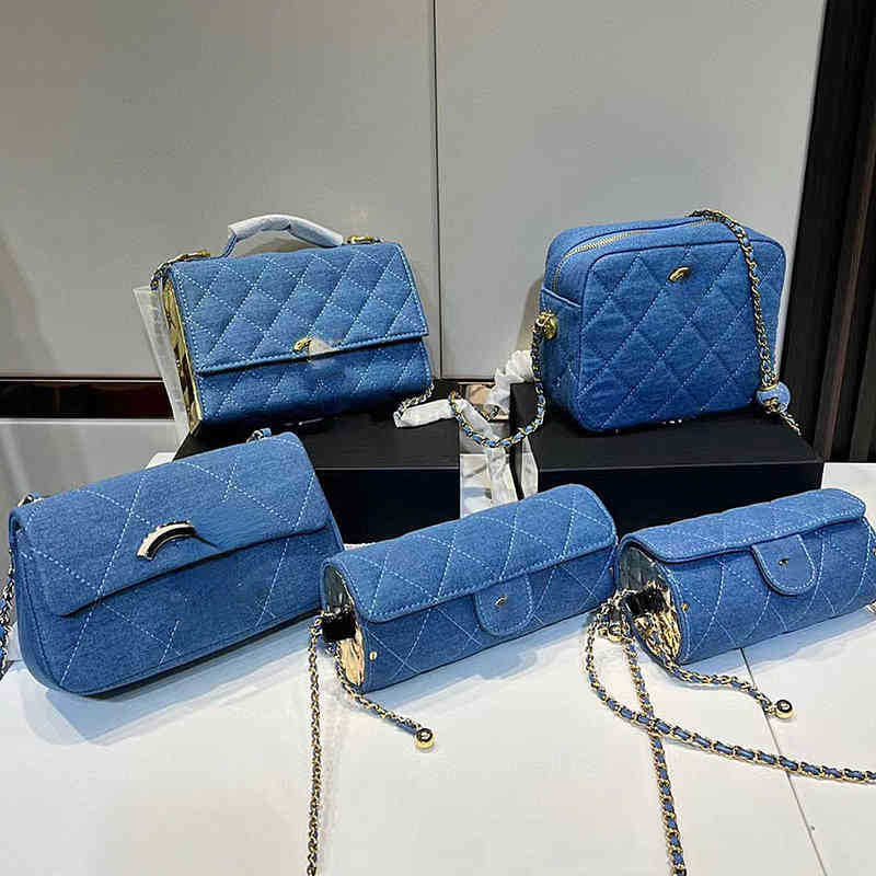 2022 early spring denim chain cover bag messenger camera handbag, Messenger bag 21 x 14
2022 early spring denim chain cover bag messenger camera handbag, Messenger bag 21 x 14
