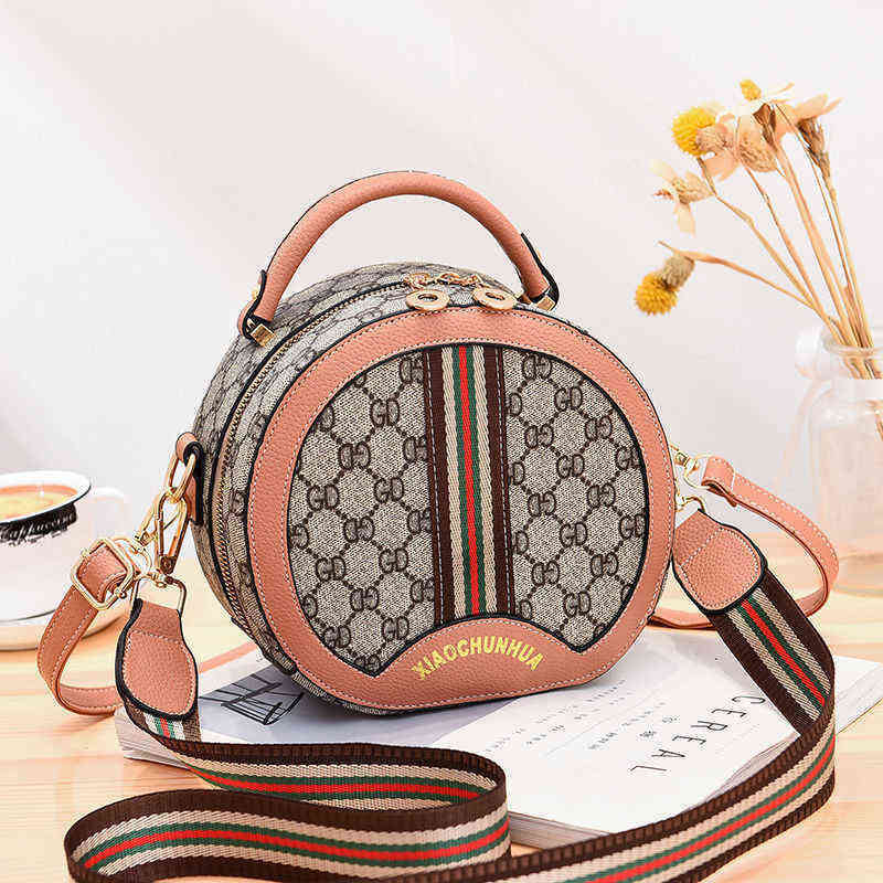 Factory direct sale Women's 2022 New Fashion Trend Simple and Versatile Foreign Style Portable Single Shoulder Messenger Round Net Red Small Bag, Black
Factory direct sale Women's 2022 New Fashion Trend Simple and Versatile Foreign Style Portable Single Shoulder Messenger Round Net Red Small Bag, Black