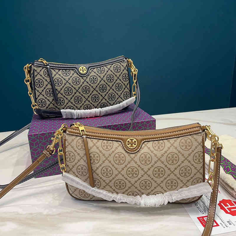 Designer Burchs Handbags Torys Printed Canvas Embroidered Round Cake Armpit Burst Single Mini Retro Women's Bag Shoulder Crossbody Bag
Designer Burchs Handbags Torys Printed Canvas Embroidered Round Cake Armpit Burst Single Mini Retro Women's Bag Shoulder Crossbody Bag