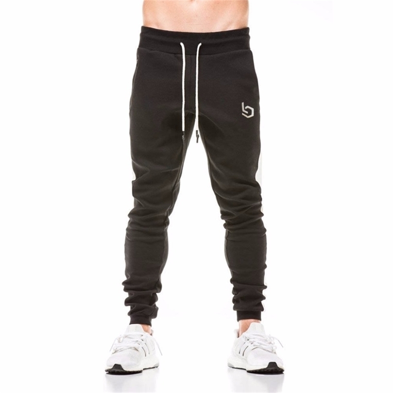 High Quality Jogger Pants Men Fitness Bodybuilding Gyms Pants For Runners Brand Clothing Autumn Sweat Trousers Britches LJ201103, Trousers thread
High Quality Jogger Pants Men Fitness Bodybuilding Gyms Pants For Runners Brand Clothing Autumn Sweat Trousers Britches LJ201103, Trousers thread