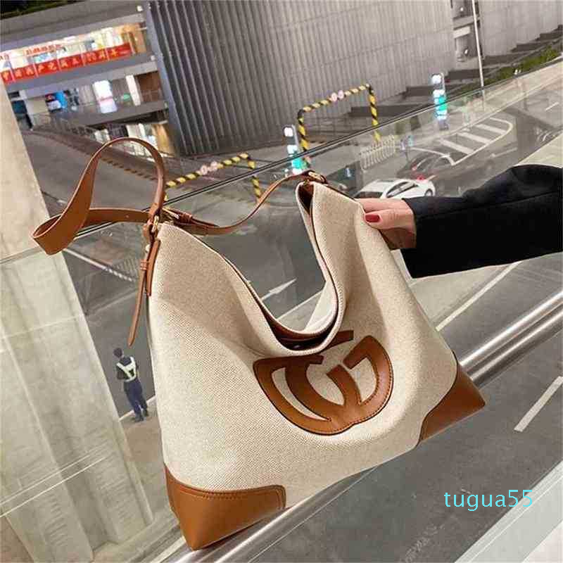 Large capacity women's summer autumn and winter fashion canvas single commuter portable Tote