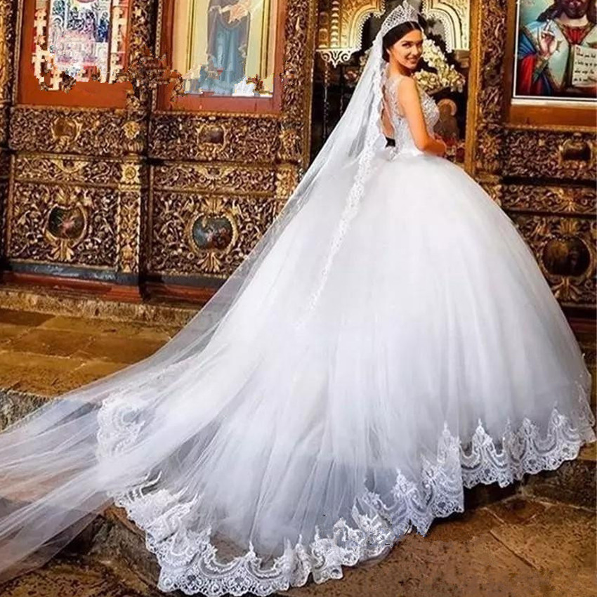 Sexy Illusion Scoop Neck Wedding Dresses Sheer Neck Sequin Lace Appliques Ball Gown Tulle Bridal Gowns Sweep Train Plus Size