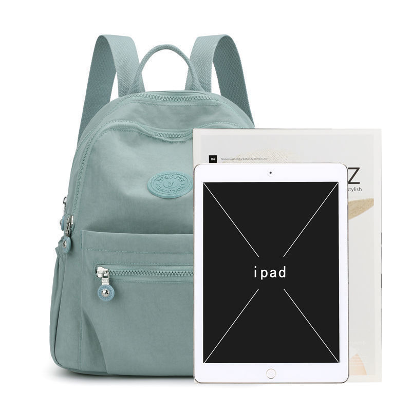 2025 NEW Fashion Lightweight Travel Bag Large Capacity Female Simple And Versatile Backpack Schoolbag 220812 original design